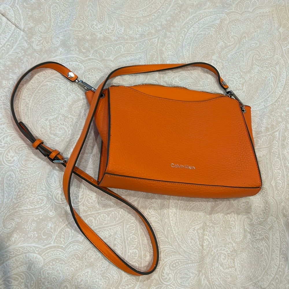 Calvin Klein pebbled orange crossbody